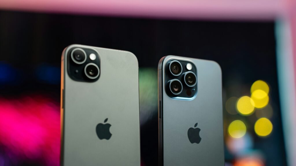 Two Apple iPhone Side by Side on a Table