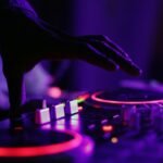 a DJ controling DJ decks