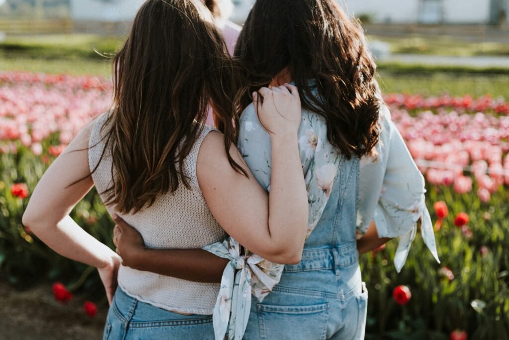 Girlfriends hugging each other